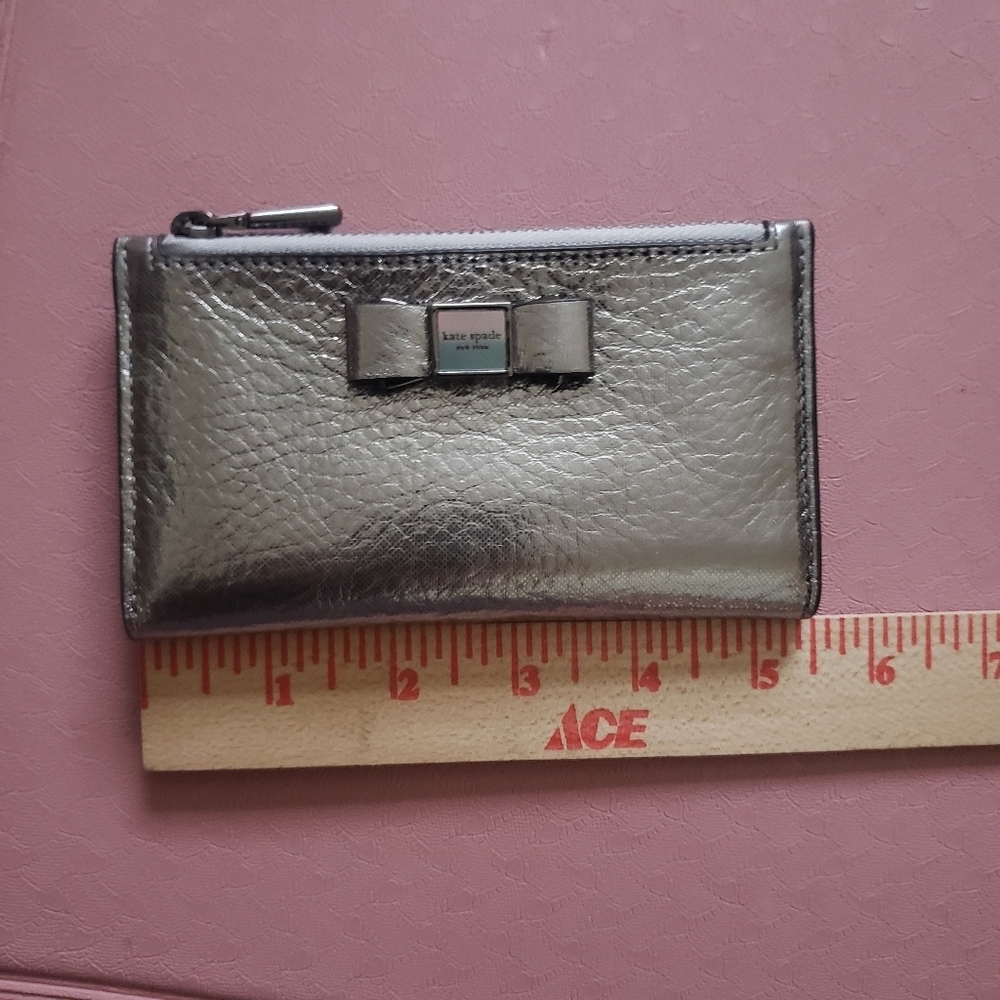 Kate Spade Metallic Silver Bow Morgan Slim Bifold Wallet